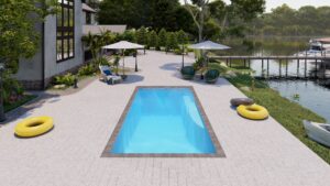 Wylela model pool in a landscaped backyard with lounge chairs, umbrellas, and floating pool toys, showcasing Eco Landscaping Design's outdoor transformation services.
