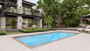 Wylela model pool installation featuring a rectangular pool surrounded by landscaped greenery and modern outdoor seating, showcasing Eco Landscaping Design's expertise in outdoor transformations.