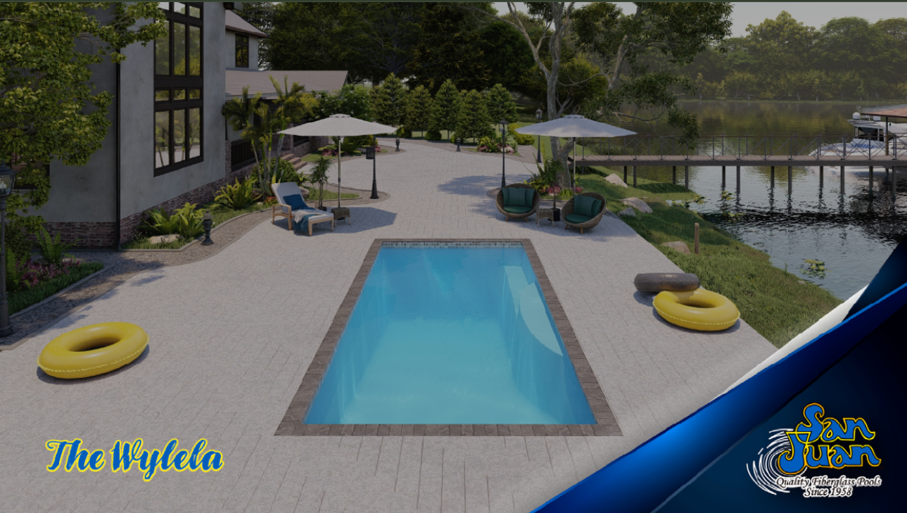 Wylela model pool in a landscaped backyard, featuring a rectangular design, lounge chairs, umbrellas, and greenery, with a view of the waterway.